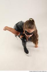 Naty BATGIRL KNEELING POSE